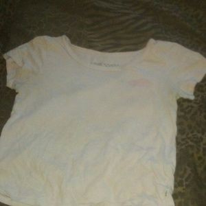 A trendy light baby pink Vans t-shirt!